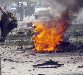 Десетки убити от коли бомби след обесването на Саддам