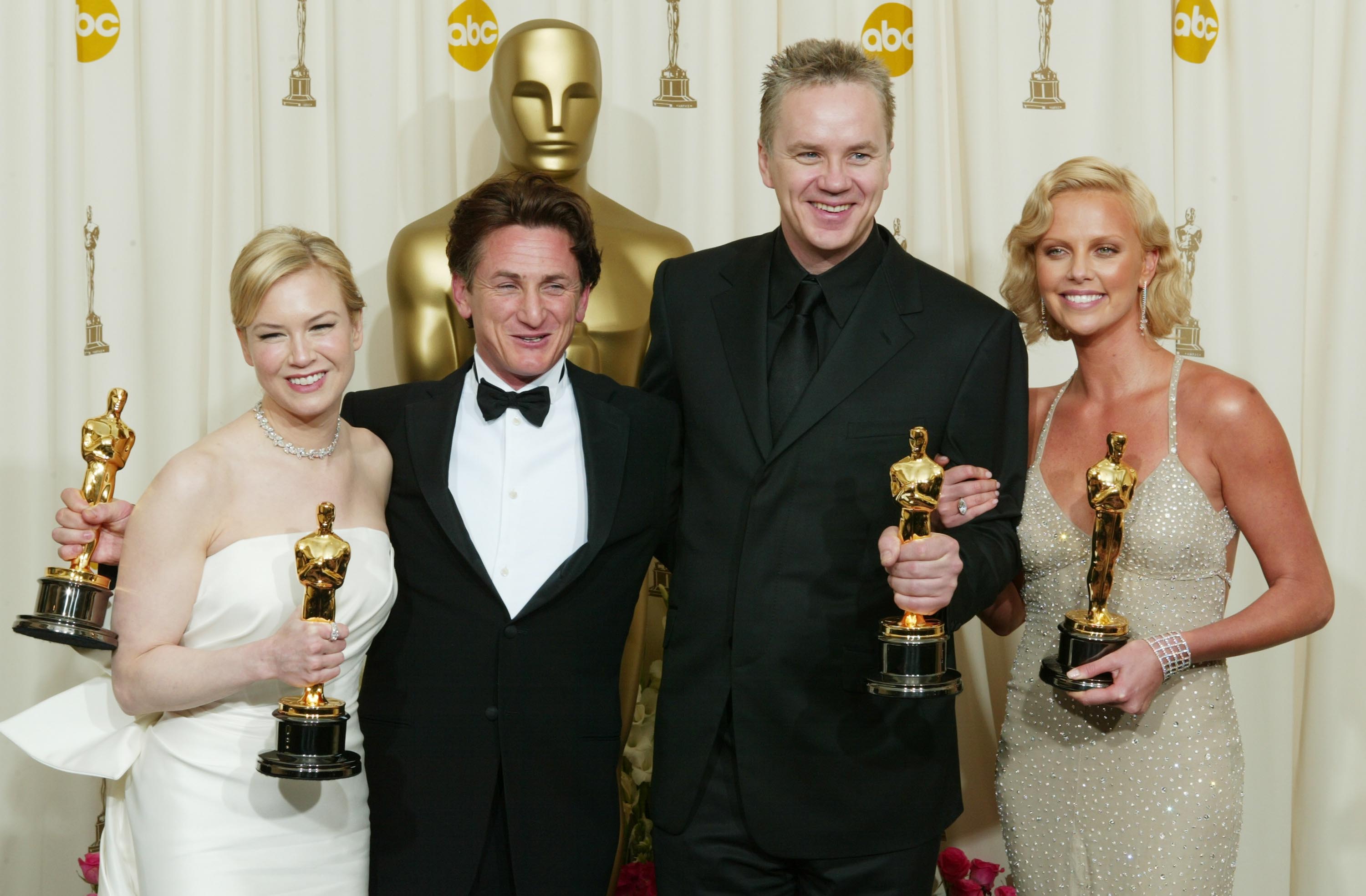 Рене Зелуегър, Шон Пен, Тим Робинс и Чарлийз Терон с Оскари за главни и поддържащи роли - 2004 година