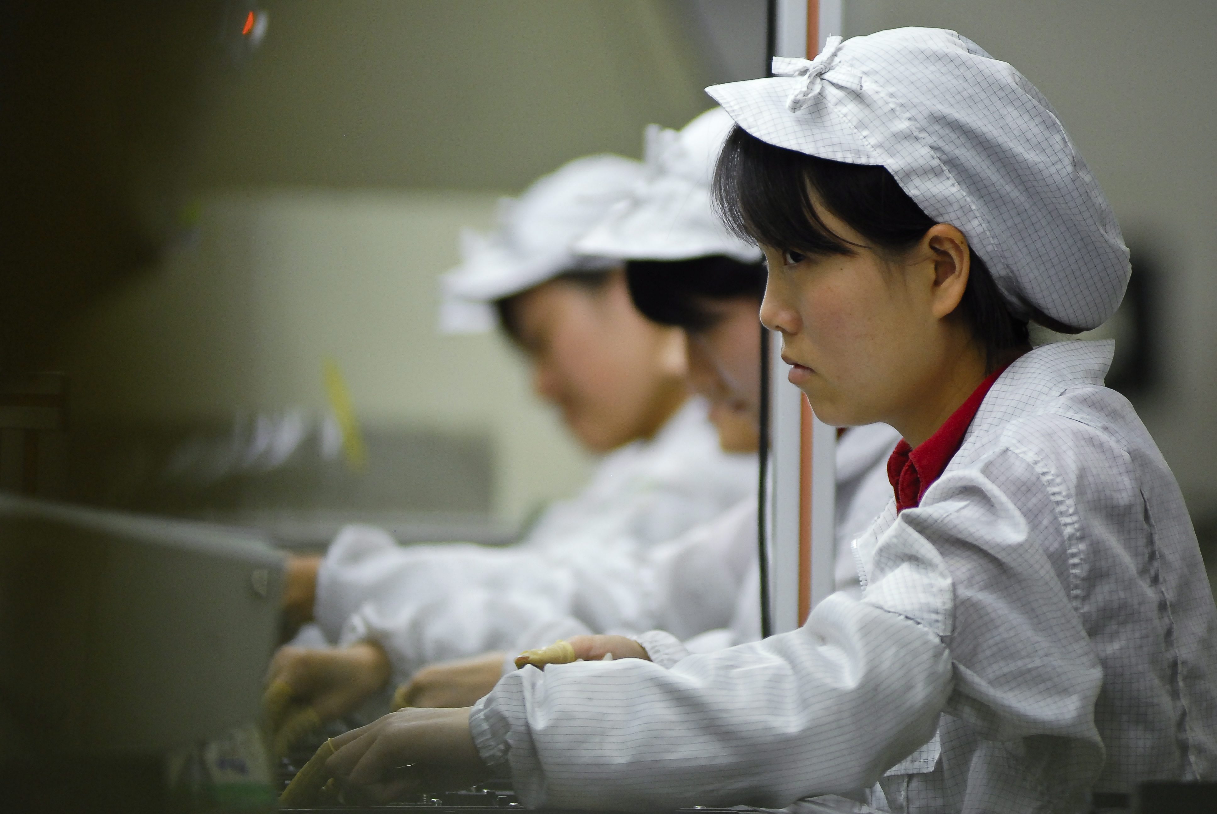 Работници в завода на Foxconn в Китай