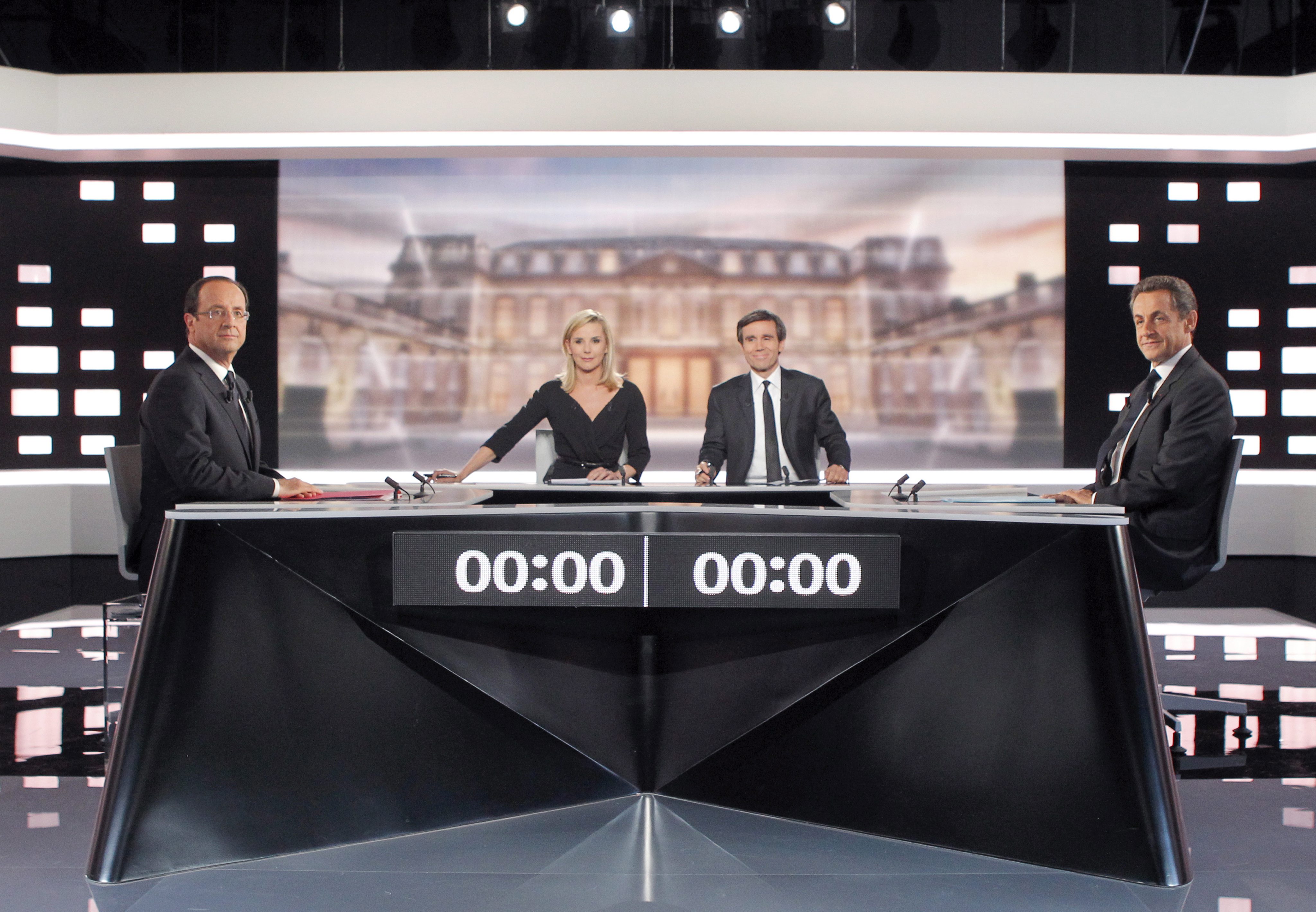Яростен дебат между Саркози и Оланд