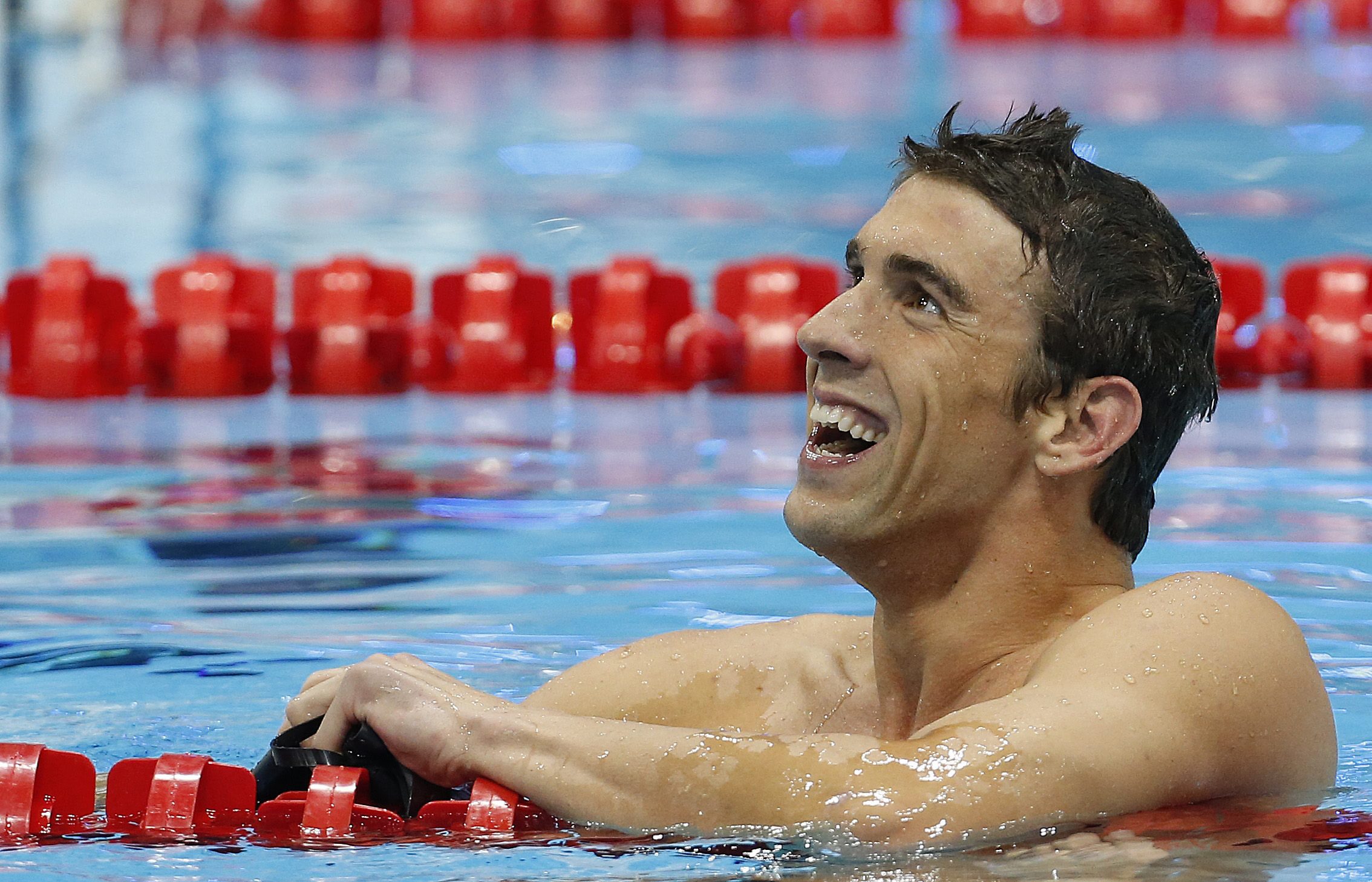 Фелпс спечели плуването на 100 метра бътерфлай на турнира в Атенс