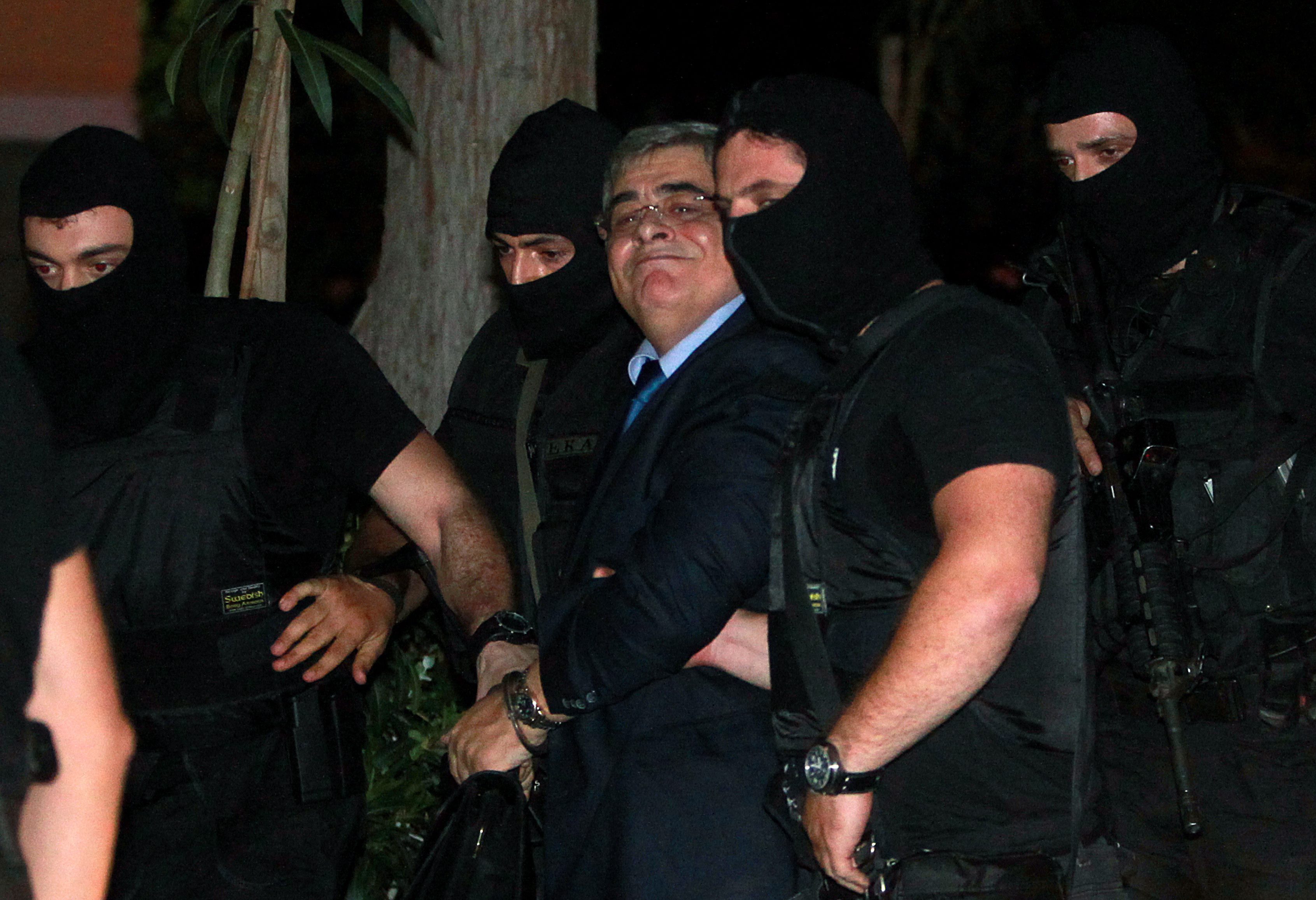 След края на заседанието Михалолиакос беше откаран в строгоохраняван затвор
