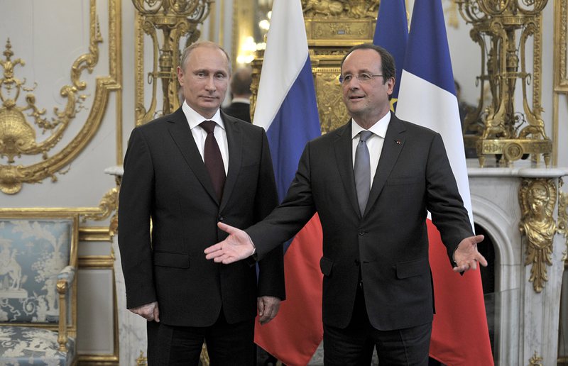 Франсоа Оланд и Владимир Путин се срещнаха в Париж