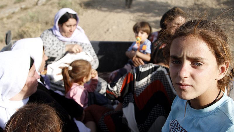 Язидски бежанци се спасяват в Турция