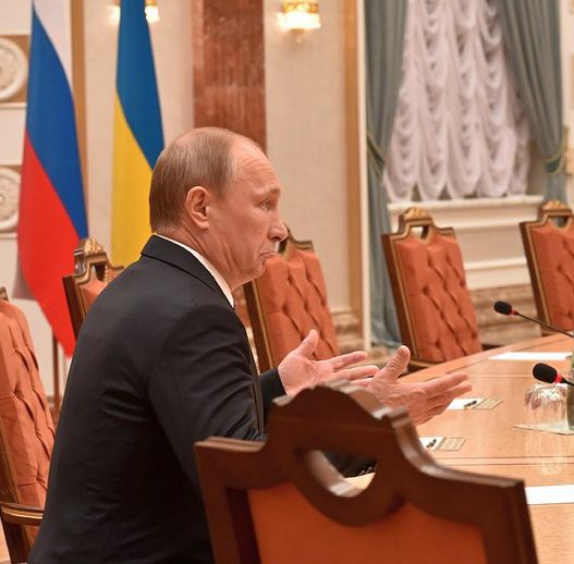 Владимир Путин на срещата в Минск