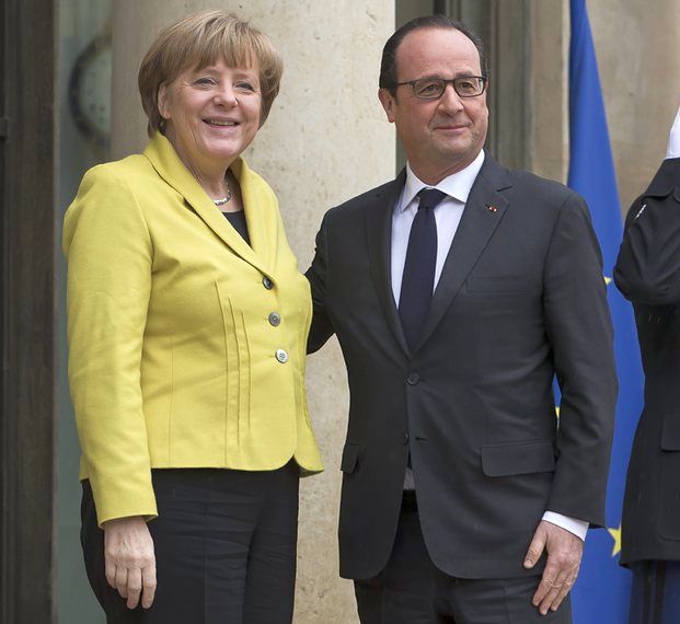 Франсоа Оланд и Ангела Меркел обещаха да са твърди, ако Путин наруши договорките
