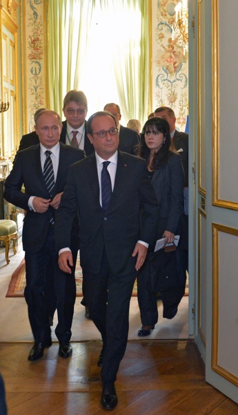 Путин и Оланд с каменни лица в Елисейския дворец