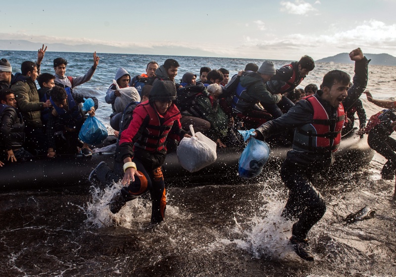Мигранти се радват на гръцкия бряг (Архив)