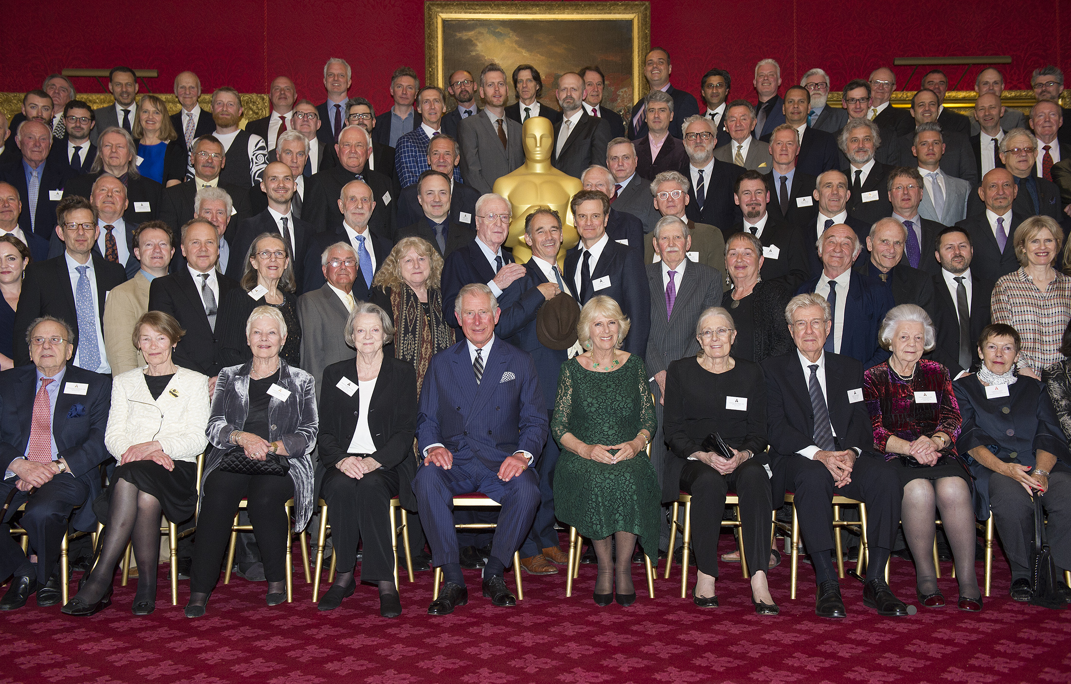 Принц Чарлз и Камила с британски носители на Оскар