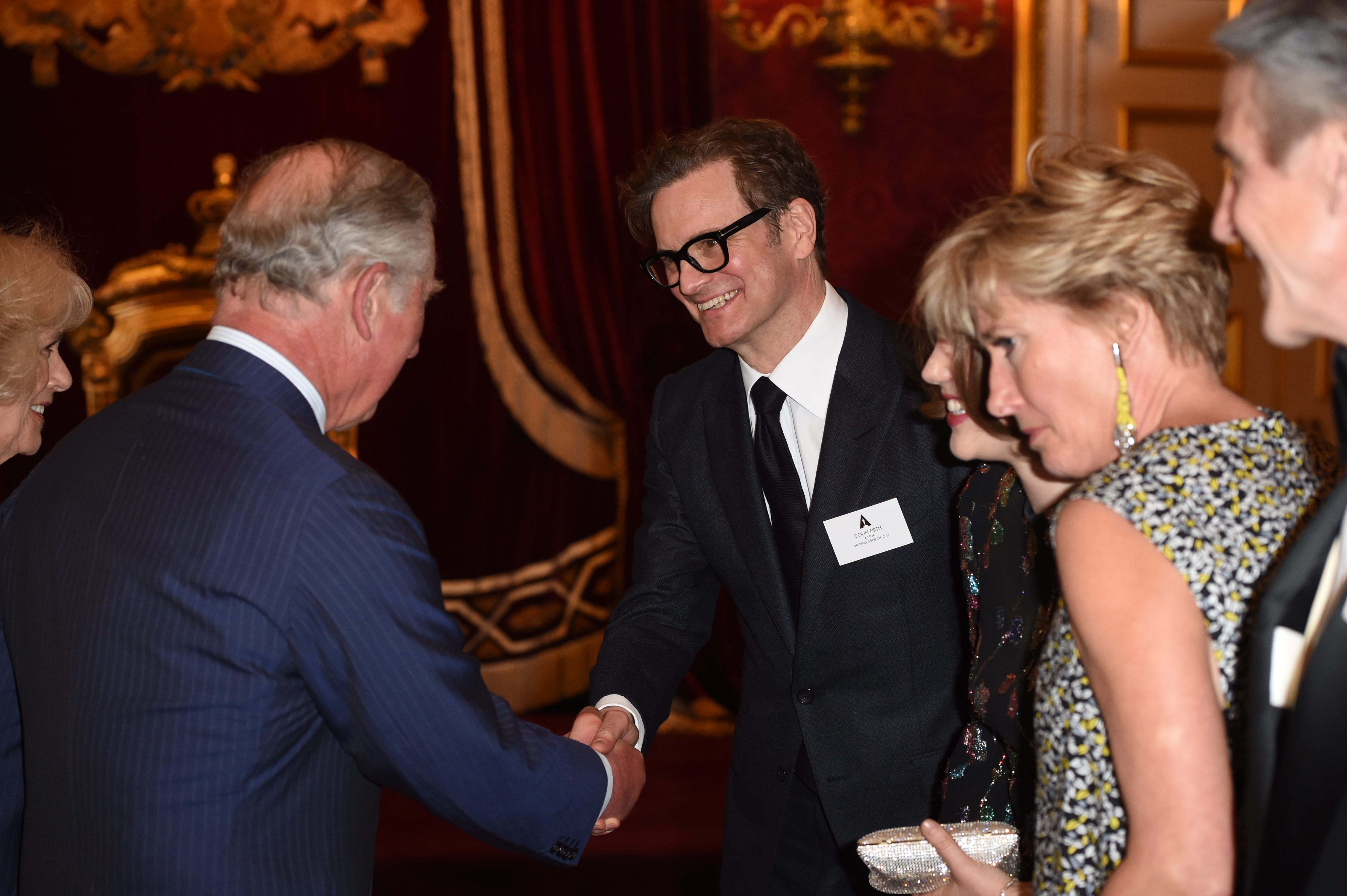 Камила и принц Чарлз посрещат Колин Фърт и Ема Томпсън