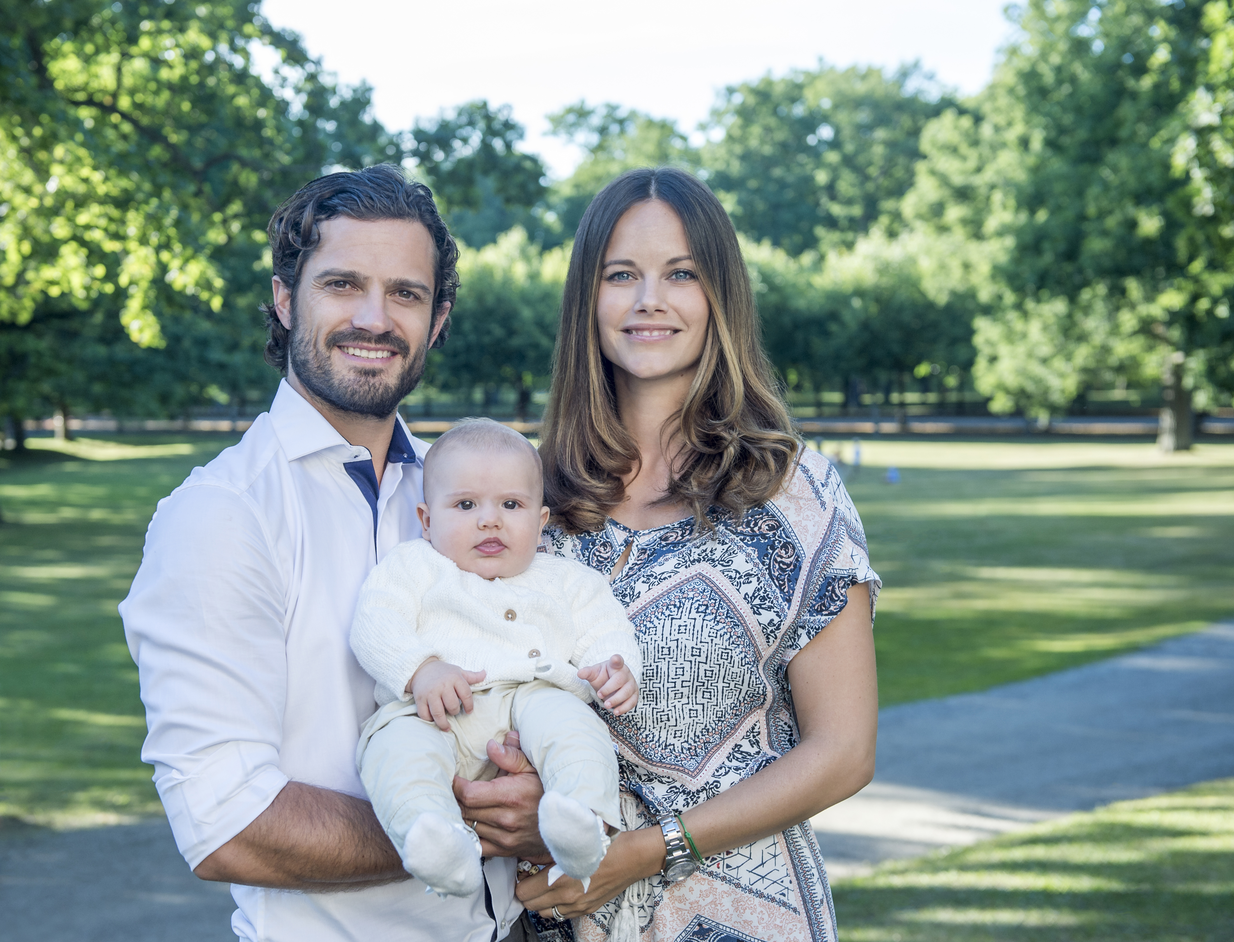 Шведският принц Карл Филип и принцеса София със сина си принц Александър