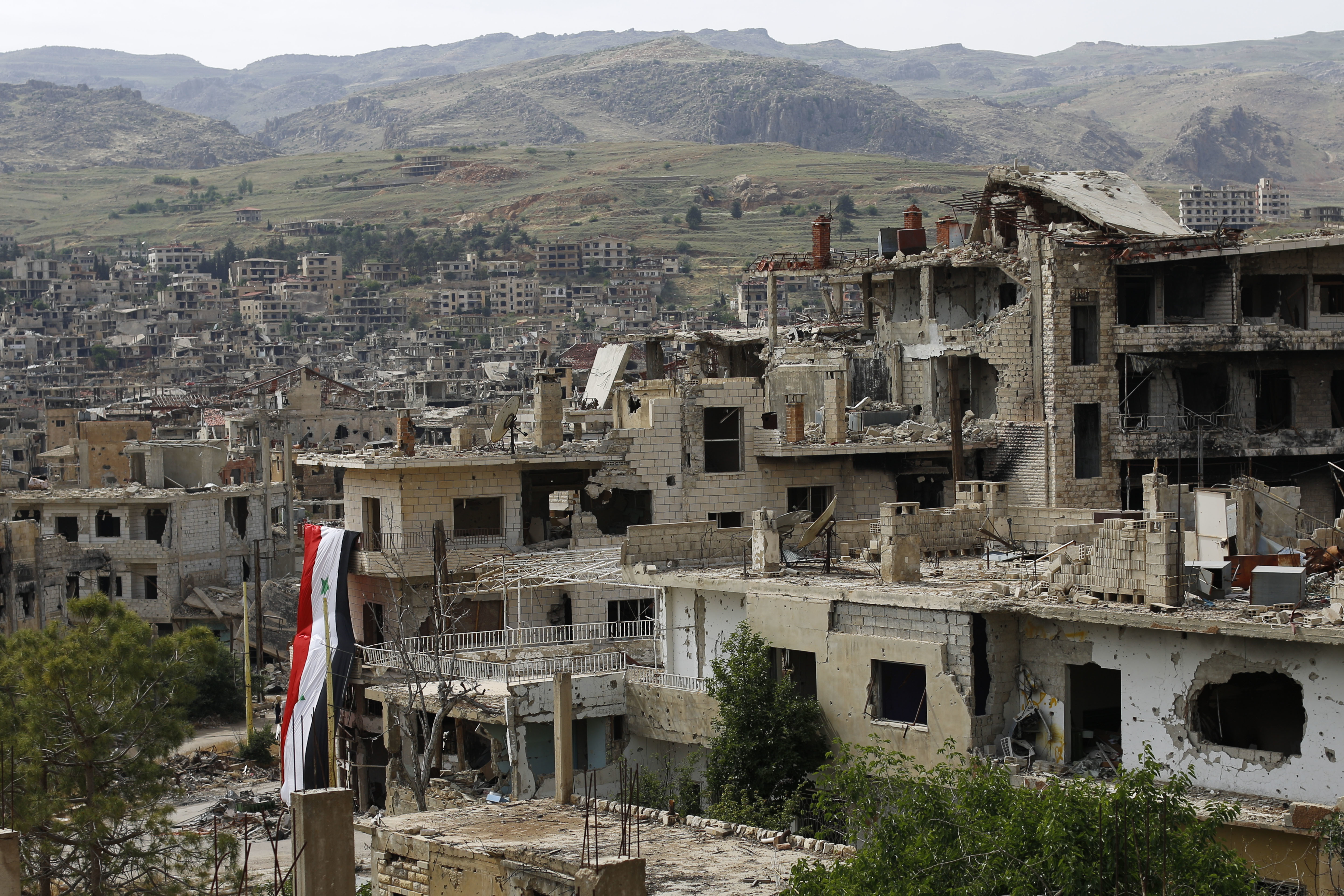 Разрушения в района на Дамаск в продължаващата вече шеста година гражданска война в Сирия
