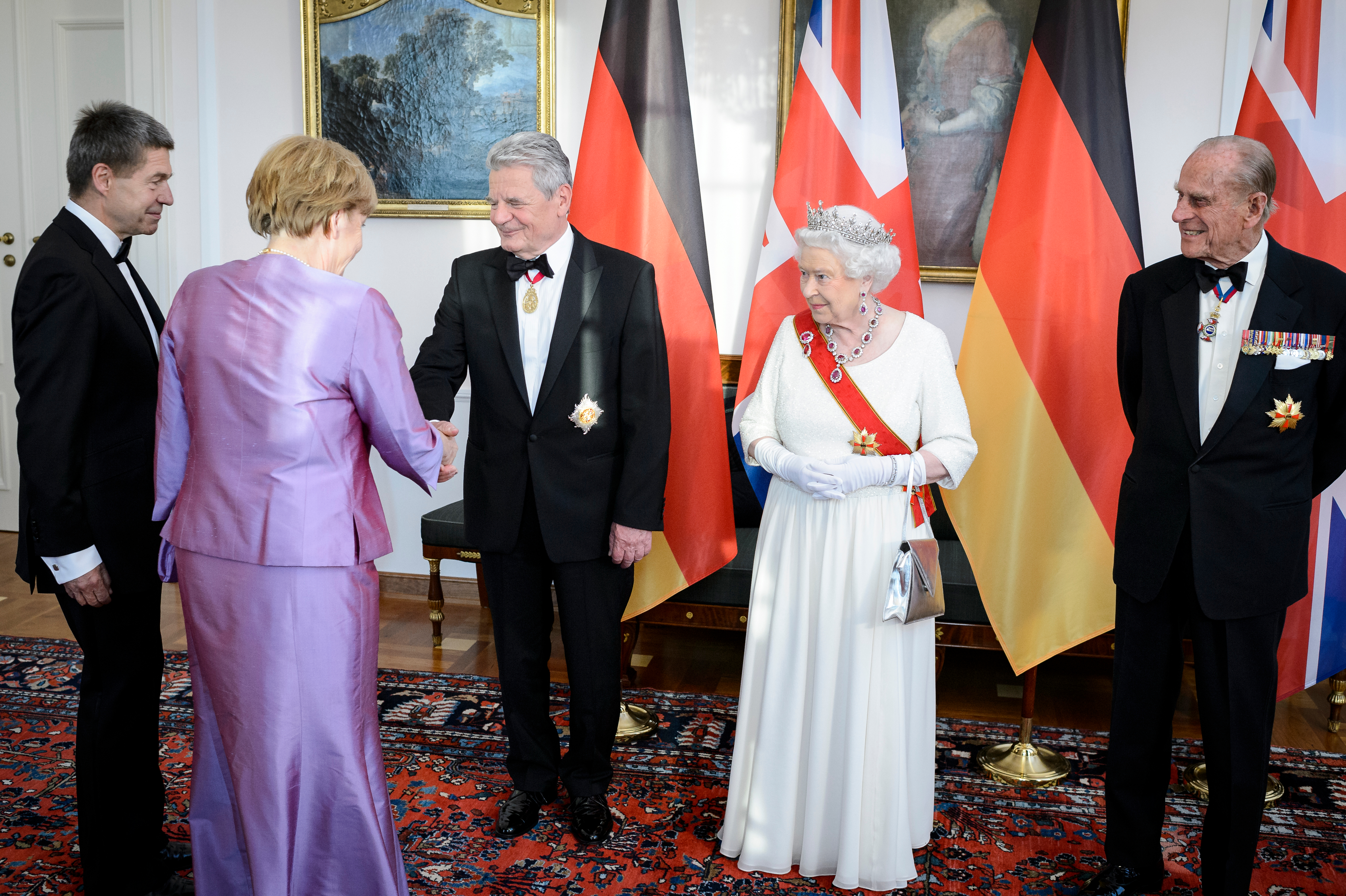Ангела Меркел и Йоахим Зауер при кралица Елизабет II и принц Филип