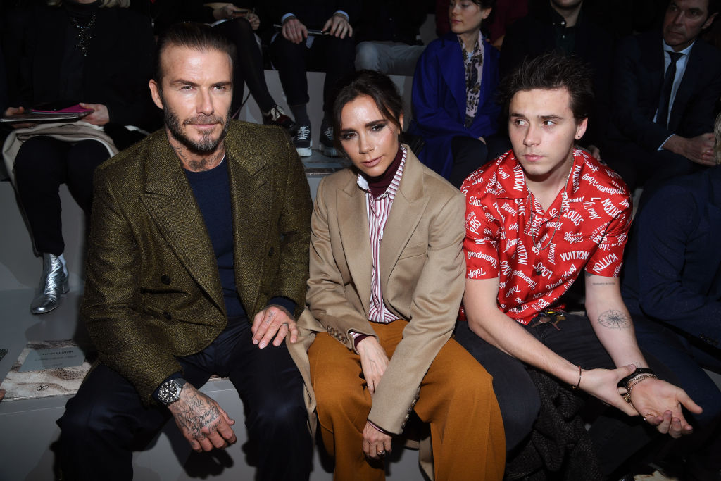 Дейвид Бекъм, Виктория Бекъм и синът им Бруклин Бекъм на ревюто на Louis Vuitton мъжката седмица на модата в Париж