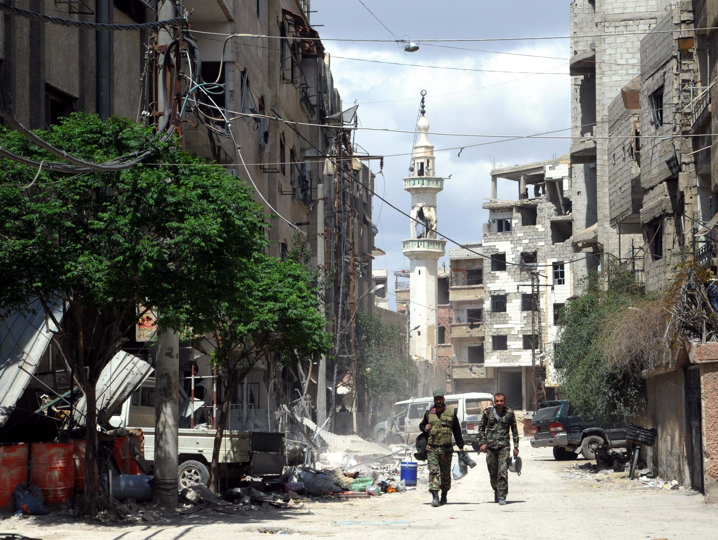 Разрушения след атаки в Сирия