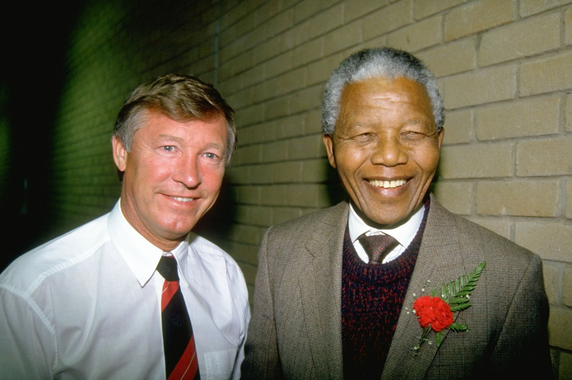 С Нелсън Мандела в началото на 90-те по време на африканско турне на Юнайтед
