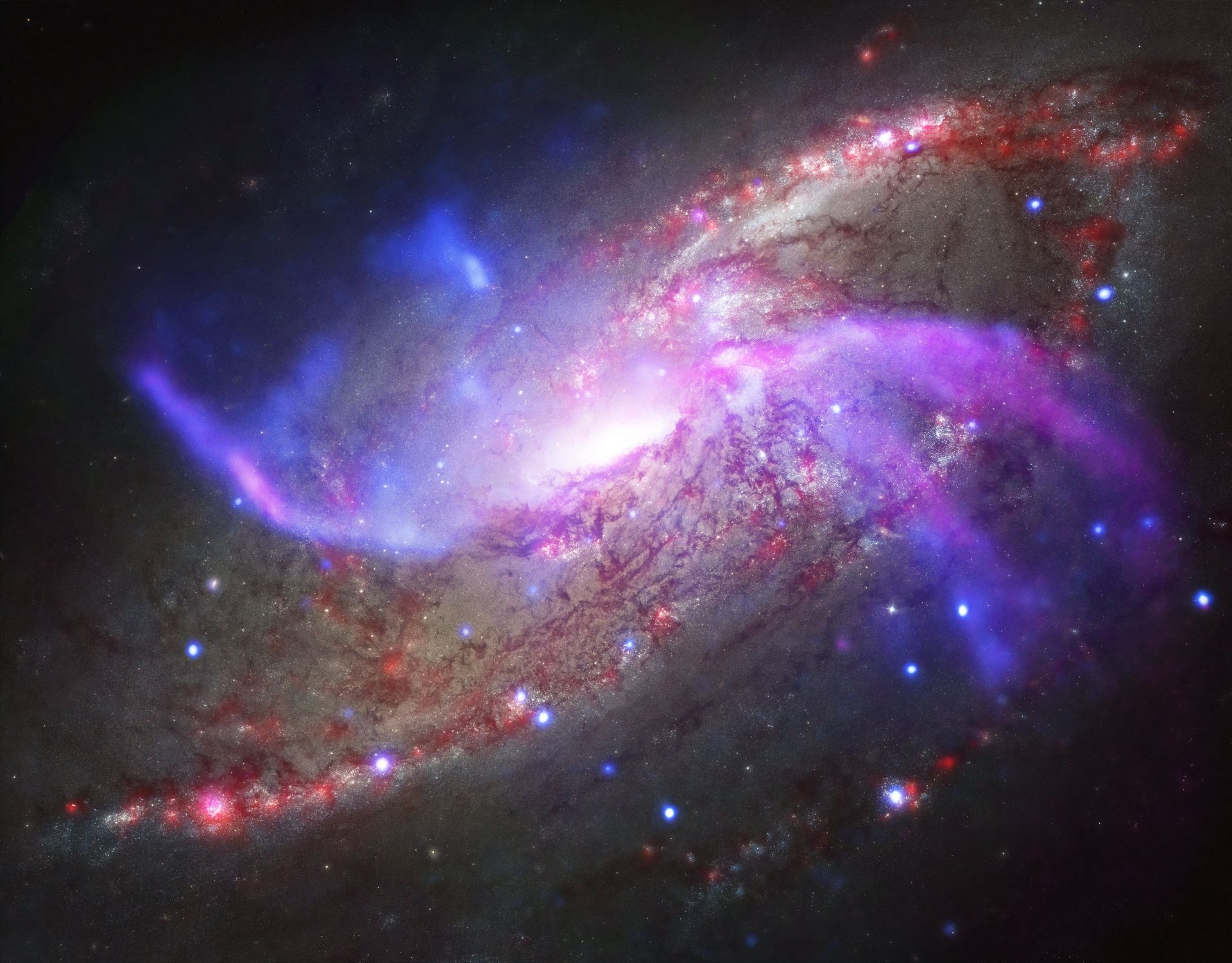 Галактиката NGC 4258, известна и като M106