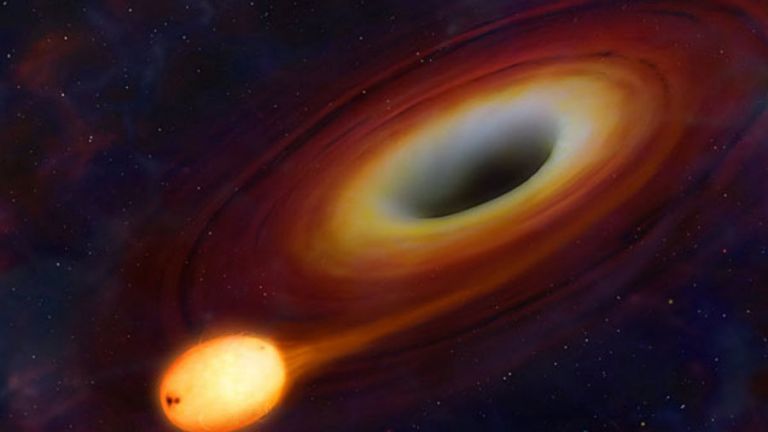 Астрономи откриха различна по размер черна дупка, поглъщаща звезди 