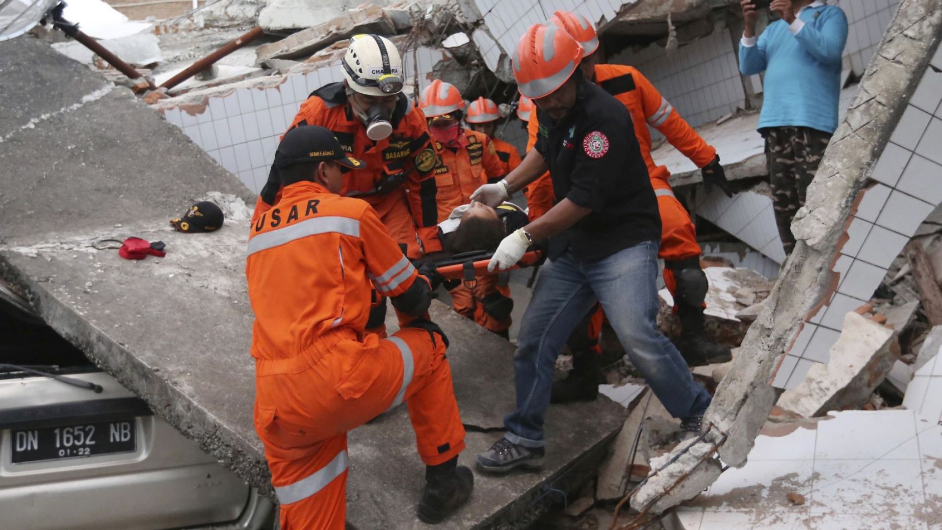 Броят на намерените тела на жертви на земетресението и вълната