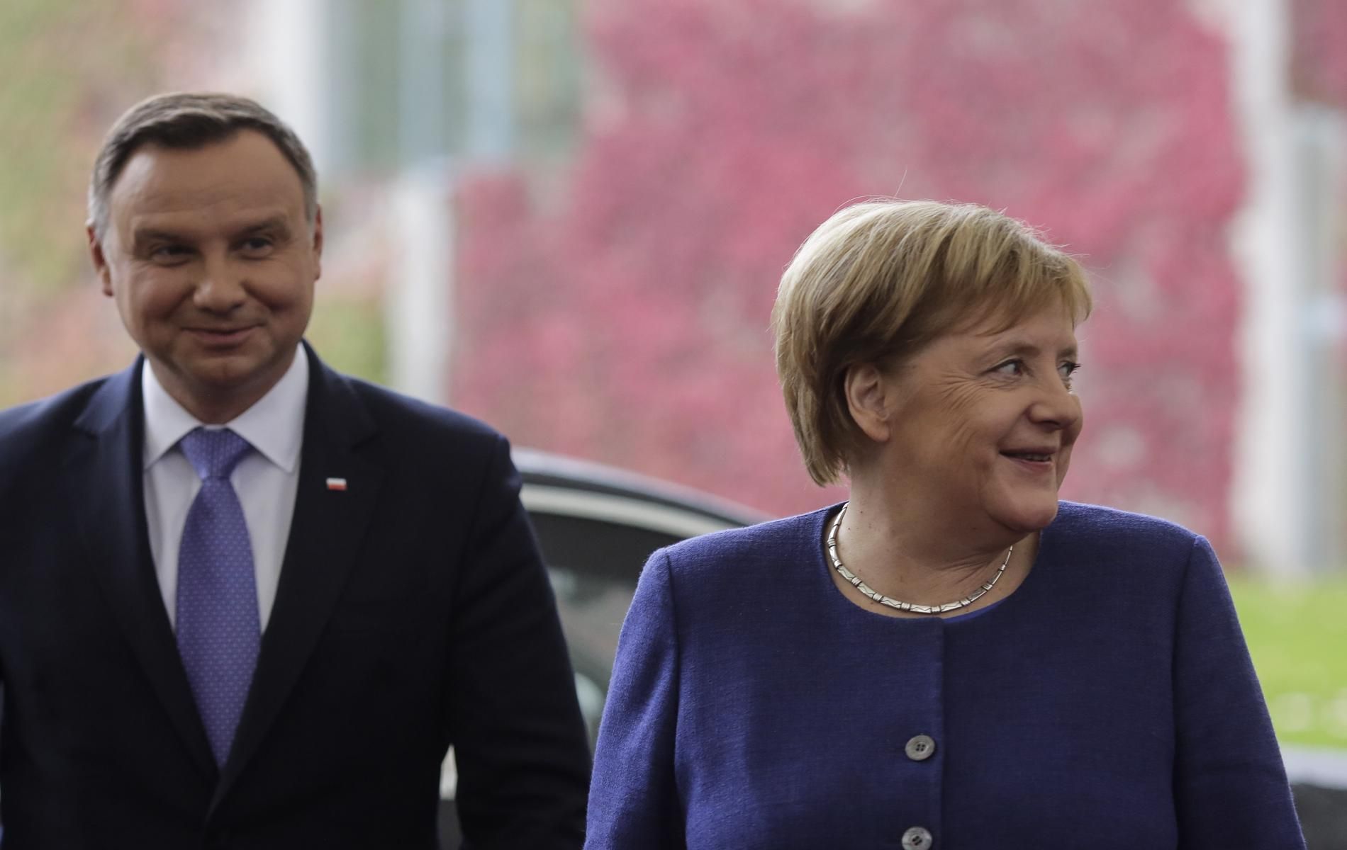 Президентът на Полша Анджей Дуда и канцлерът на Германия Ангела Меркел. Двете страни спорят и за "Северен поток 2", и за газопровода ОПАЛ, който свързва "Севрен поток" с потребителите в Централна и Западна Европа