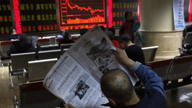 Пекин намалява прогнозите си за растеж