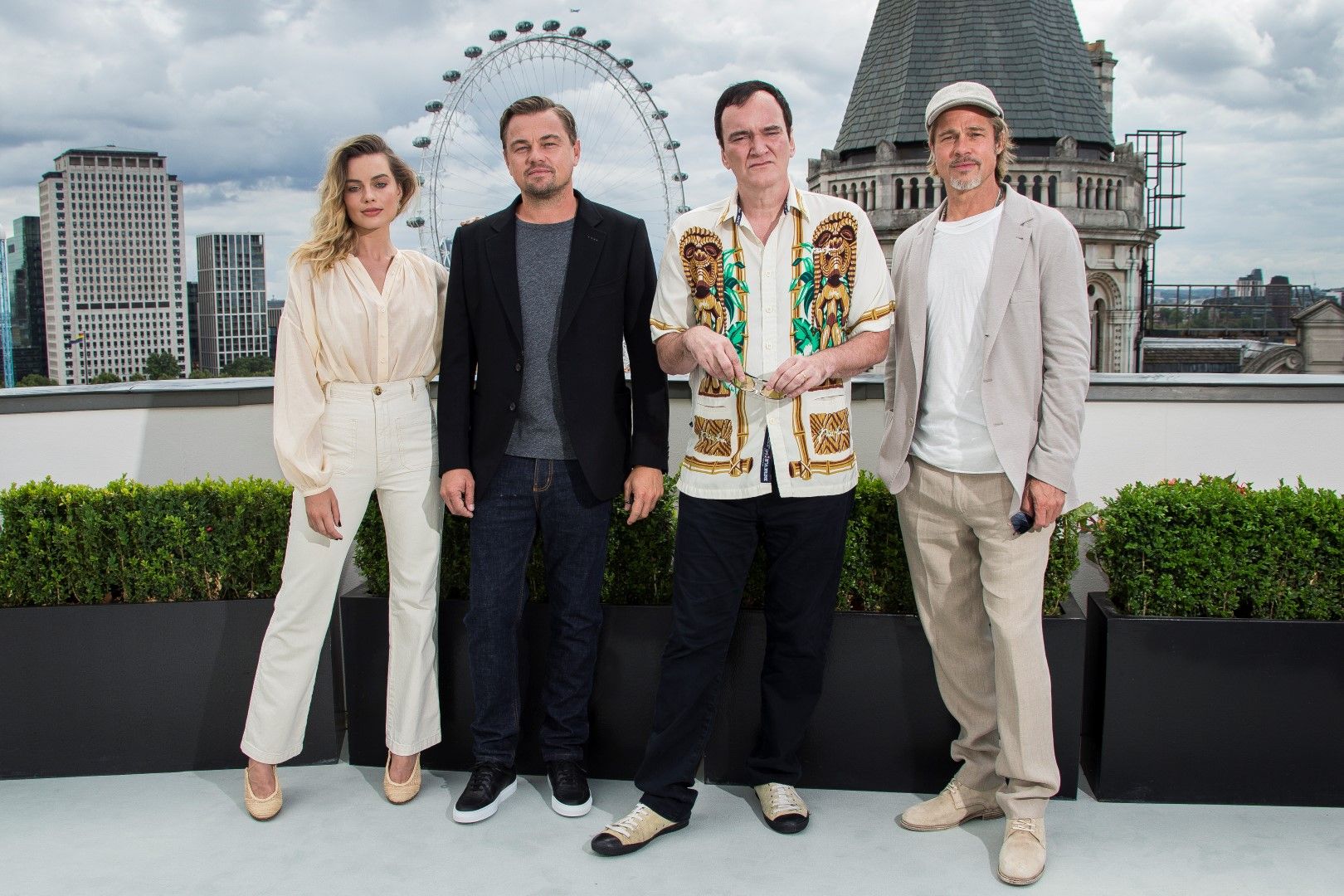 Марго Роби, Леонардо ди Каприо, Куентин Тарантино и Брад Пит преди премиерата в Лондон