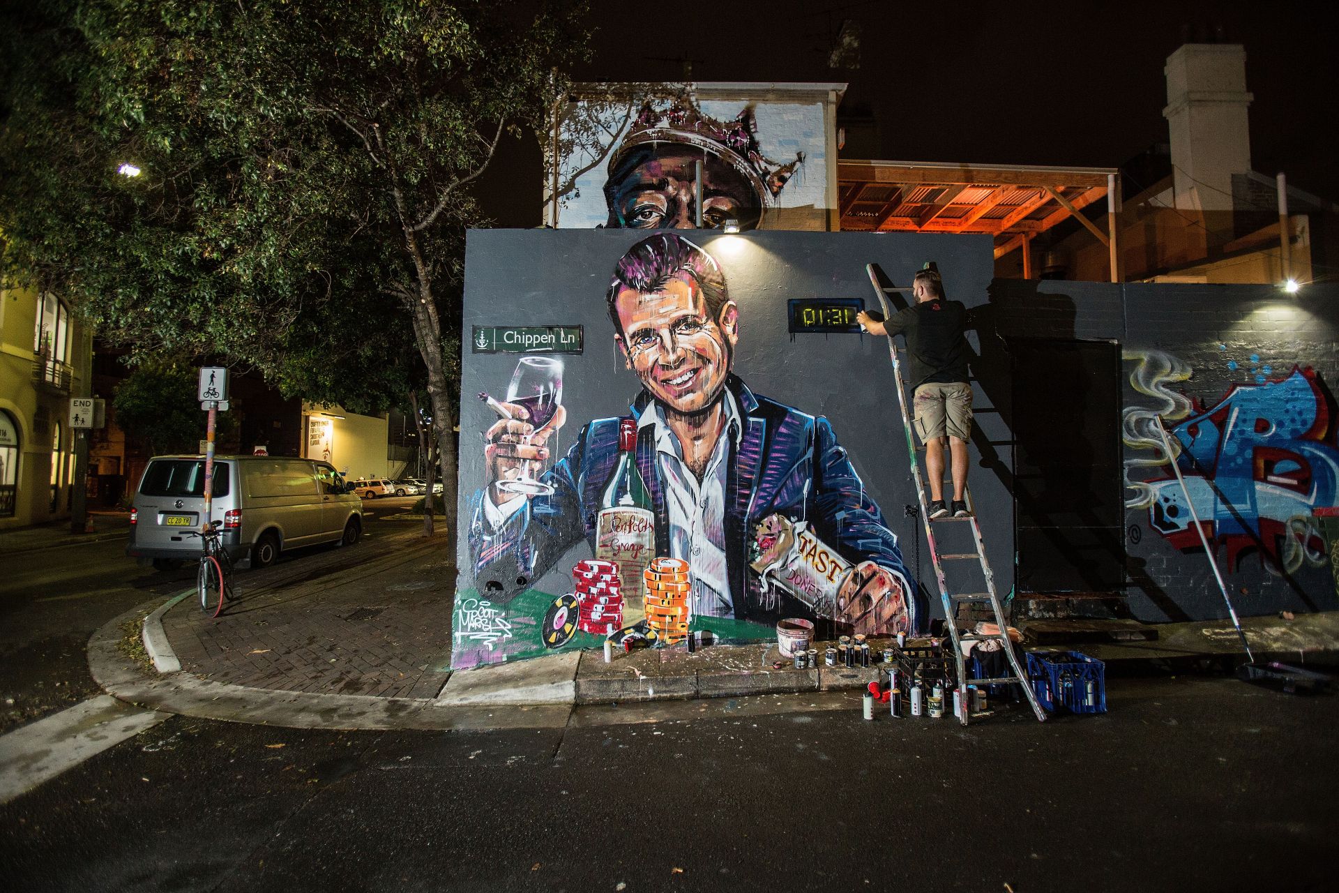Графит с образа на губернатора на щата Нов Южен Уелс Майк Беърдна. Провокацията на Марш във връзка със законовите реформи за нощния живот. 