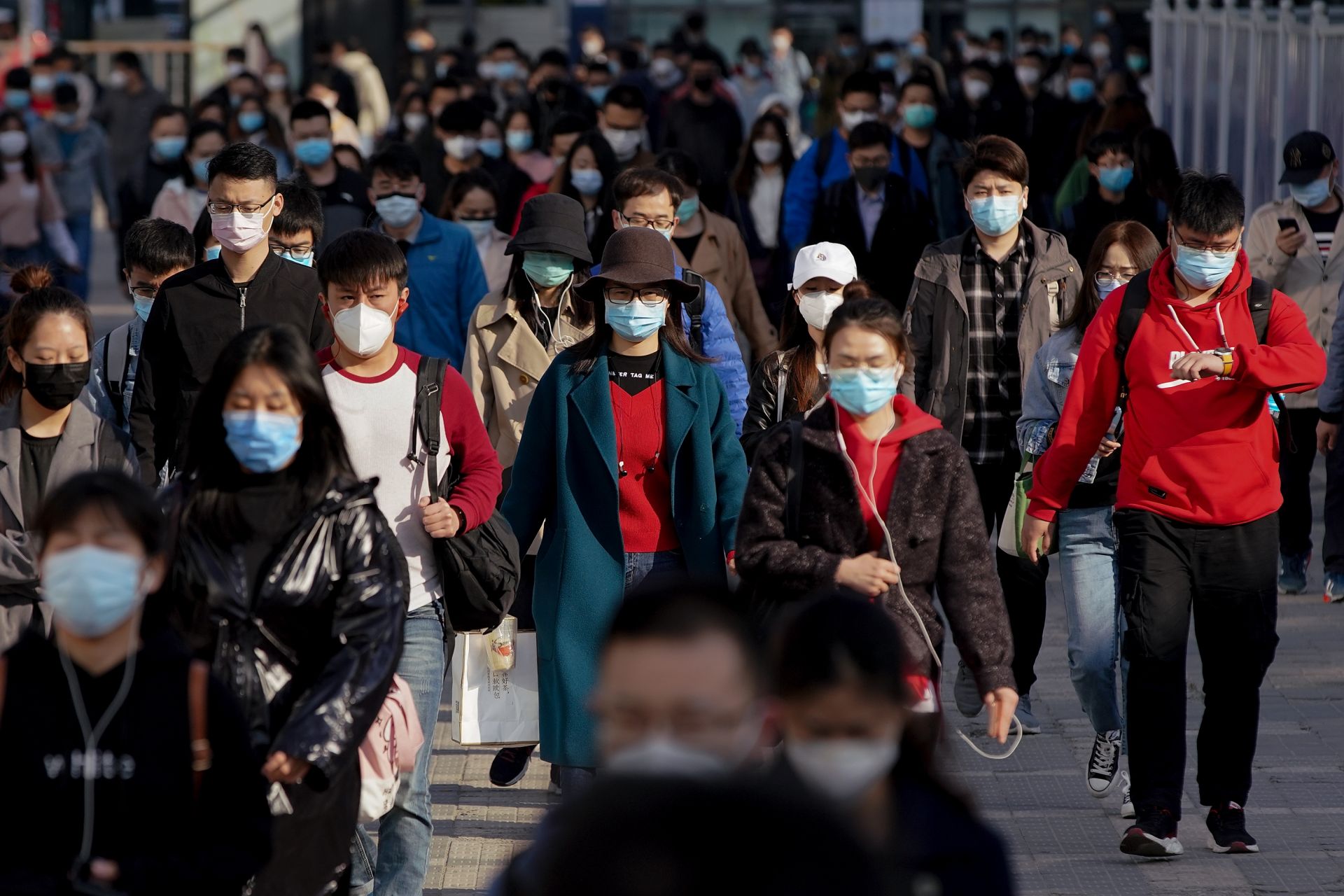 Хора по улиците на Пекин