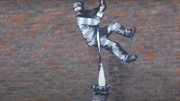 Банкси призна авторството на графити върху затворническа стена в Рединг
