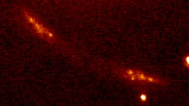 Учени превърнаха галактически клъстер в огромен телескоп