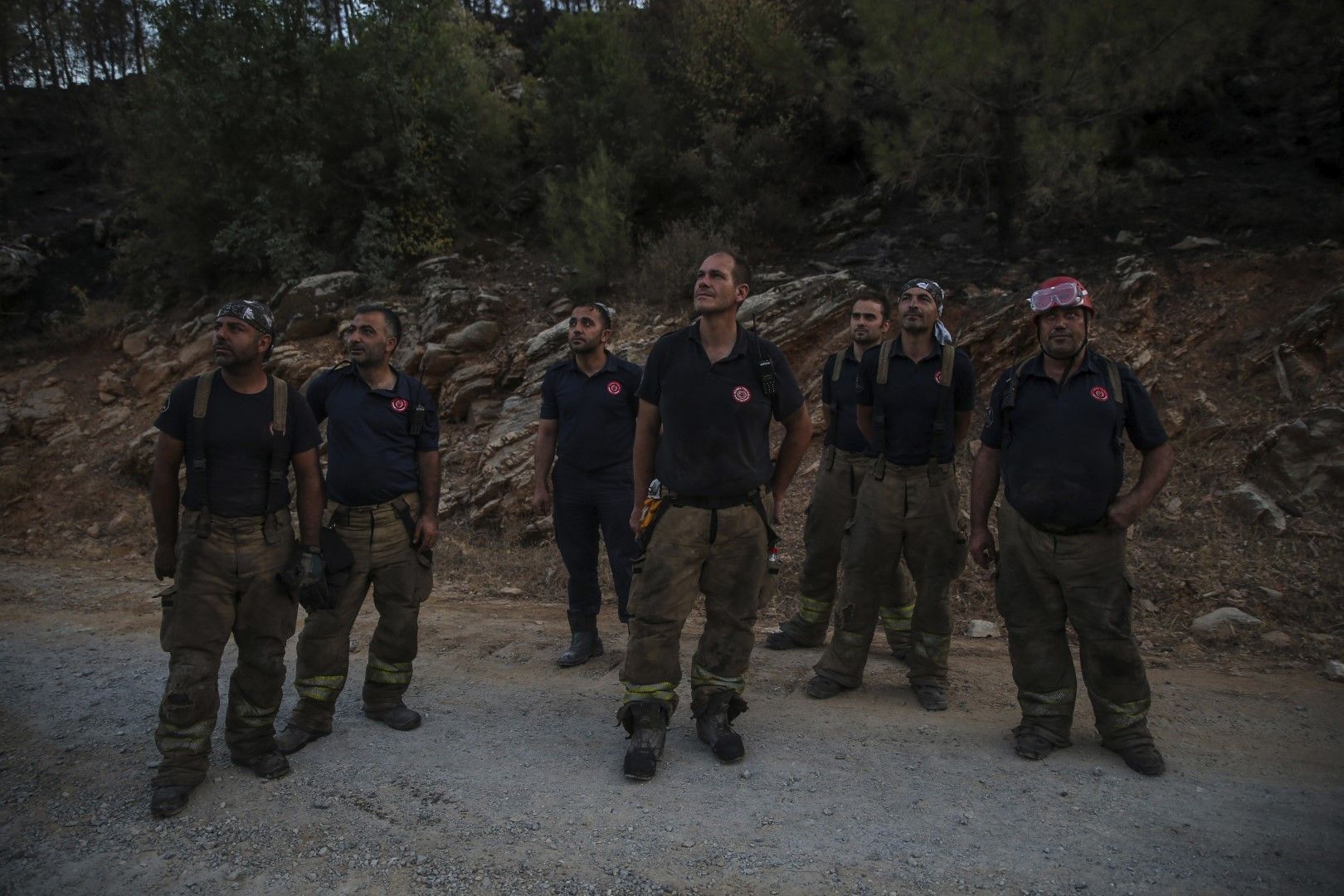 Огнеборци оглеждат района на Милас, Мугла в  Турция в събота, 7 август 2021 г. В крайморската провинция Мугла повечето пожари изглежда са овладени 