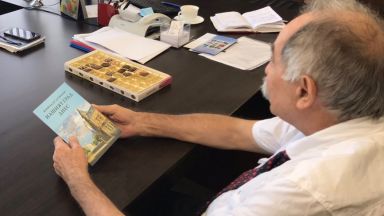 Стихотворението Нашият град днес написано от русенския поет Живодар Душков