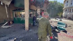 При обстрел на Донецк загинаха 13 цивилни, сред тях две деца (видео)