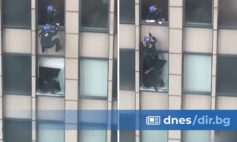Полицай се спусна с въже по фасадата на небостъргач в
