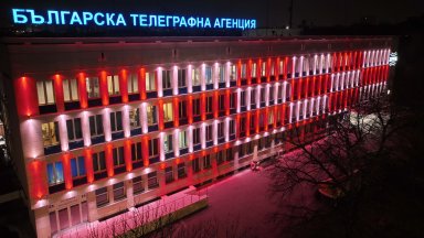 Фасадата на сградата на БТА светна в бяло и червено по случай Баба Марта